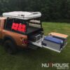 full extension bed slide, pull out expedition truck slide, aluminum bed slide, pick up truck camp kitchen, ARB fridge freeze, truck bed pull out slide, truck camping, car camping, overland setup, offroad camping, partner steel stove, partner steel griddle, maple cutting board, truck with onboard water, truck with onboard battery, truck kitchen, offroad kitchen, expedition kitchen, full kitchen on back of truck, tail gating kitchen, truck camp kitchen, adventure kitchen, adventure truck kitchen, slide out truck kitchen, rotopax, james barroud, hard shell tent, hard shell rtt, hard shell rtt rack, Hard deck, aluminum truck bed cover, Dry truck storage, secure truck bed, truck bed shelf, coiling cover, coiling truck cover, aluminum coiling cover, retracting coil cover, Removable panel hard deck, truck bed with removable cover, load bearing truck cover, aluminum truck cover, locking truck cover, secure truck bed cover, strongest truck bed cover, headache rack, cargo rack, truck bed rack with cover, Nuthouse Industries, Nuthouse Industries rack, Nuthouse, aluminum truck rack, aluminum bed rack, aluminum expedition truck rack, overland rack, overland truck rack, expedition truck bed rack, overland gear, roof top tent rack, RTT rack, custom truck rack, overland, overland pickup, overland pickup truck, offroad pickup, pickup truck rack, overlanding full size truck, car camping, truck camping, ladder rack, removable cross bar, tacoma truck rack, truck bed rack, expedition truck, rotopax, best overland rack, truck vault, overland storage, action packer for car camping, overland vehicles, Nuthouse rack, Nuthouse industries, nutzo rack, ford super duty rack, ford raptor, ford f150, gm rack, chevy rack, toyota overland rack, tacoma overland, expedition rack, expedition truck, off road truck rack, offroad truck rack, off road truck bed rack, mid size truck rack, mid size overland, off road rack, rotopax vision x, vision x dura mini, cvt rack, cvt tent rack, diesel overland, overland diesel, maxtrax, tred pro, traction plate, , truck rack awning mount, overland awning mount, expedition truck rack awning mount, 23 Zero rack, chase rack, best overlanding rack, nuthouse industries, nuthouse industries rack, nutzo rack, aluminum rack, aluminum overlanding rack, aluminum rtt rack, trailer tent, Off road expedition bed rack, off road bed rack, off road truck bed rack, rhino rack awning, rhino rack 270,