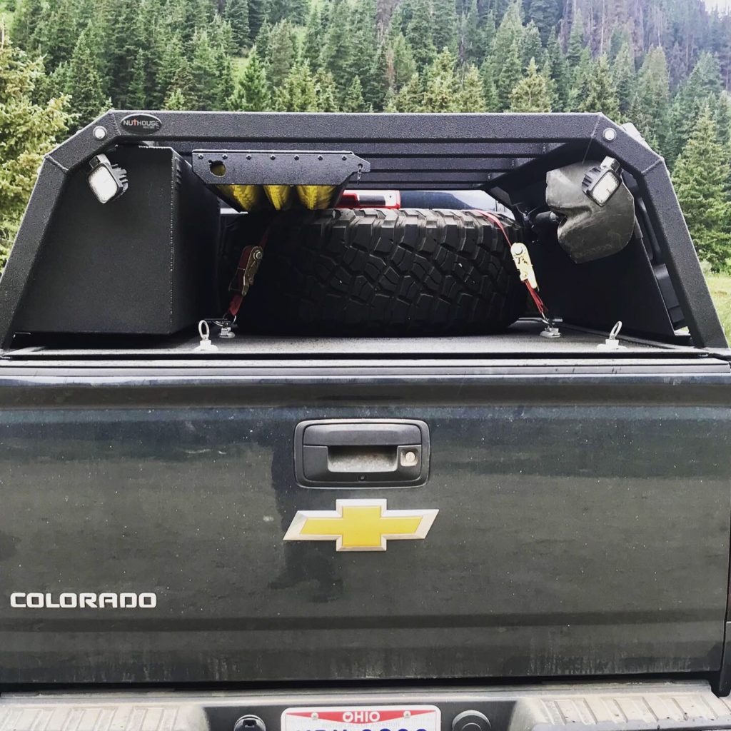 zr2 overland rack, zr2 overland, colorado zr2 rack, Chevy zr2 overland, zr2 off road, zr2 truck rack, zr2 truck, diesel zr2, diesel overland, canyon overland rack, gmc canyon rack, colorado/canyon truck, zr2 expedition rack, diesel expedition truck, 2.8 duramax overland, mini duramax offroad truckmini max overland, expedition zr2, overland zr2, best overland rack zr2, chevy off road, chevy overland, gmc overland, gmc canyon rack, zr2 bed rack, mid size truck rack, diesel coloradao, 2.8 duramax, 2.8 duramax overland, gmc canyon overland rack, racks for toyota tacoma, tacoma overland gear, overland tacoma, tacoma expedition rack, toyota overland, toyota expedition gear, toyota expedition rack, mid size truck rack, Hard deck, aluminum truck bed cover, Dry truck storage, secure truck bed, truck bed shelf, coiling cover, coiling truck cover, aluminum coiling cover, retracting coil cover, Removable panel hard deck, truck bed with removable cover, load bearing truck cover, aluminum truck cover, locking truck cover, secure truck bed cover, strongest truck bed cover, headache rack, cargo rack, truck bed rack with cover, Nuthouse Industries, Nuthouse Industries rack, Nuthouse, aluminum truck rack, aluminum bed rack, aluminum expedition truck rack, overland rack, overland truck rack, expedition truck bed rack, overland gear, roof top tent rack, RTT rack, custom truck rack, overland, overland pickup, overland pickup truck, offroad pickup, pickup truck rack, overlanding full size truck, car camping, truck camping, ladder rack, removable cross bar, tacoma truck rack, truck bed rack, expedition truck, rotopax, best overland rack, truck vault, overland storage, action packer for car camping, overland vehicles, Nuthouse rack, Nuthouse industries, nutzo rack, ford super duty rack, ford raptor, ford f150, gm rack, chevy rack, colorado bed rack, tacoma bed rack, ford bed rack, toyota overland rack, tacoma overland, expedition rack, expedition truck, off road truck rack, offroad truck , rack, off road truck bed rack, mid size truck rack, mid size overland, off road rack, rotopax, vision x, vision x dura mini, cvt rack, cvt tent rack, diesel overland, overland diesel, maxtrax, tred pro, traction plate, , truck rack awning mount, overland awning mount, expedition truck rack awning mount, 23 Zero rack, chase rack, best overlanding rack, nuthouse industries, nuthouse industries rack, nutzo rack, aluminum rack, aluminum overlanding rack, aluminum rtt rack, trailer tent, Off road expedition bed rack, off road bed rack, off road truck bed rack, adventure rack, bed cage, aluminum storage boxes, universal mounting plate, made in the USA, American made, east coast overlanding, Rotopax, rotopax gas can, rotopax, water can, rotopax storage, rotopax fuel, Spare tire shelf, store extra gear on Rambox, overland rack extra gear,